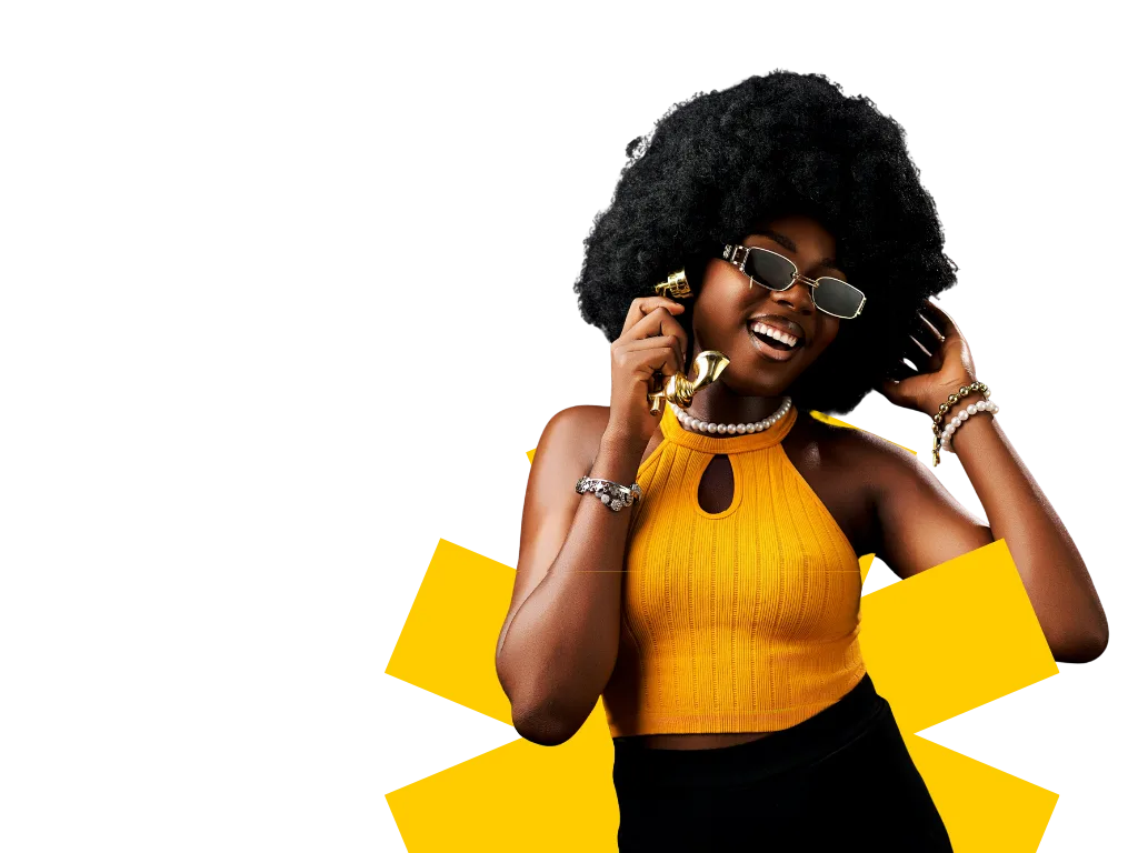 A business owner on the phone, smiling, framed by the yellow OSC asterisk