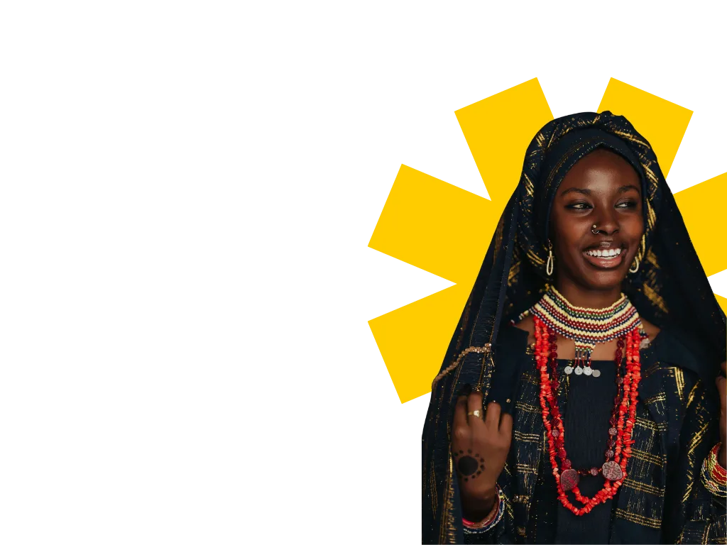 A smiling woman in a dark headscarf and beaded necklace, framed by the yellow OSC asterisk